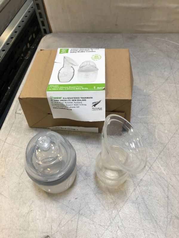 Photo 2 of 100 ml silicone breast pump and 1 baby bottle 