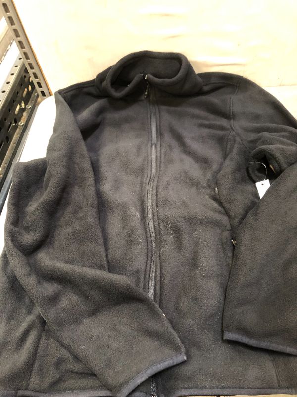 Photo 1 of black long-sleeved jacket ( item is dirty ) 