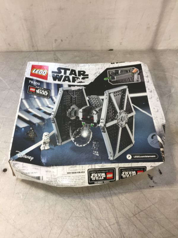 Photo 3 of STARWARS lego imperial tie fighter - box is factory sealed but box is damaged 