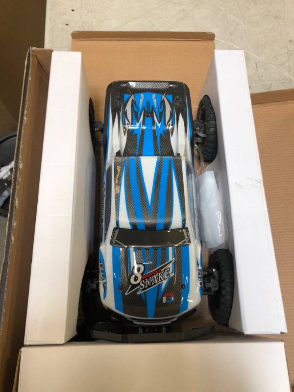 Photo 2 of DEERC 9200E Large Hobby RC Cars, 48 KM/H 1:10 Scale Fast High Speed Remote Control Car for Adult Boy,Extra Shell 4WD 2.4GHz Off Road Monster RC Truck Toy All Terrain Racing,2 Batteries for 40 Min Play
