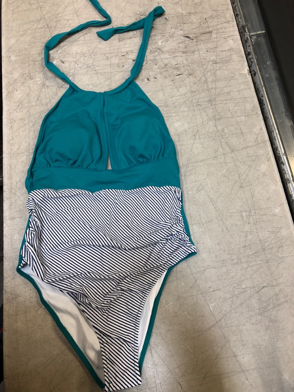 Photo 4 of Black Knotted Scalloped One Piece Swimsuit. Large
Aqua Textured And Striped Halter One Piece Swimsuit


