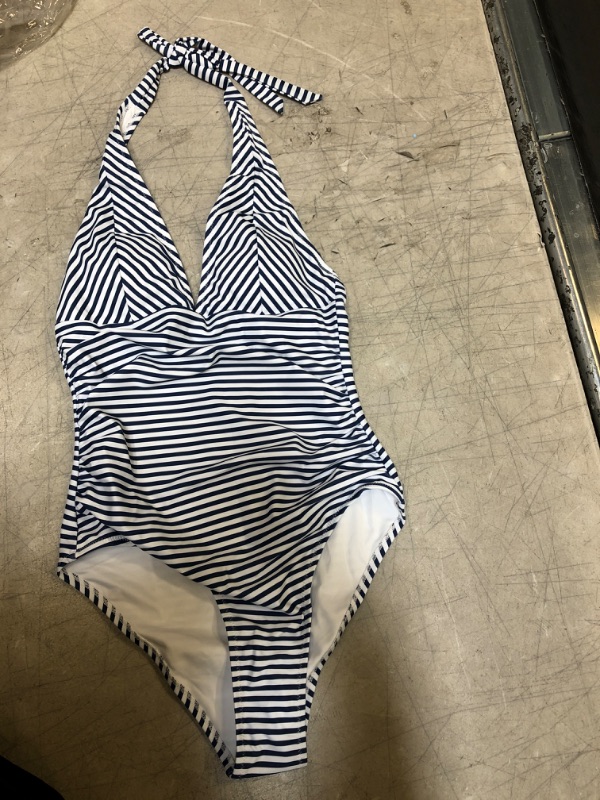 Photo 4 of Blue Floral Strappy One Piece Swimsuit. Small
Blue And White Stripe Halter One Piece Swimsuit. Small


