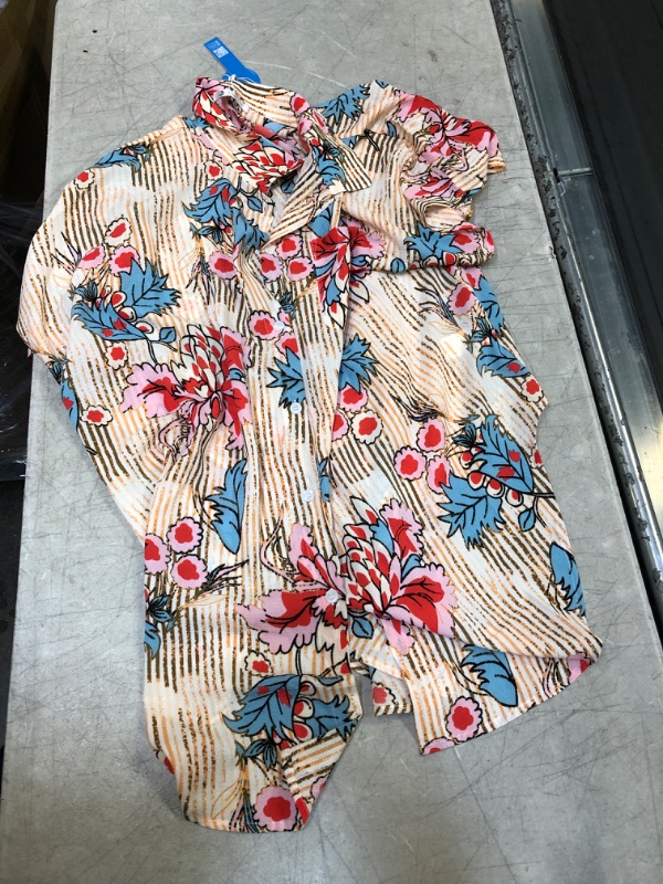 Photo 1 of Carly Colorblock One Piece Swimsuit. Large
Floral Print Buttoned Cover Up. Large

