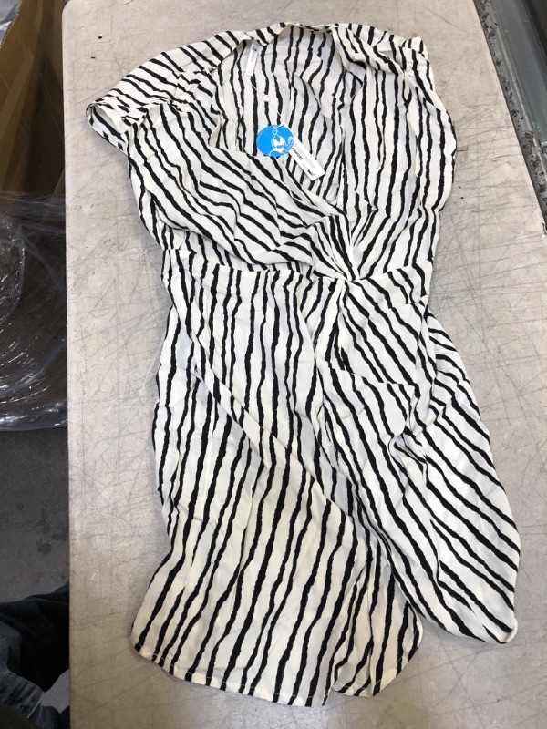 Photo 2 of Eva Wave Striped V-Neck Sleeveless Dress Medium
White And Black Stripe Ruffle One Piece Swimsuit. Large

