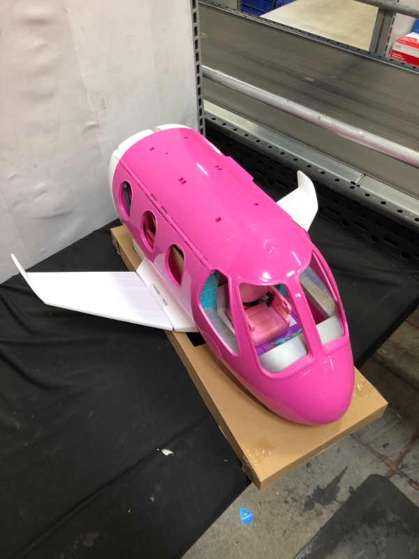 Photo 5 of Barbie Dreamplane Transforming Playset with Reclining Seats and Working Overhead Compartments, Plus 15+ Pieces Including a Puppy and a Snack Cart, for Kids 3 Years Old and Up
