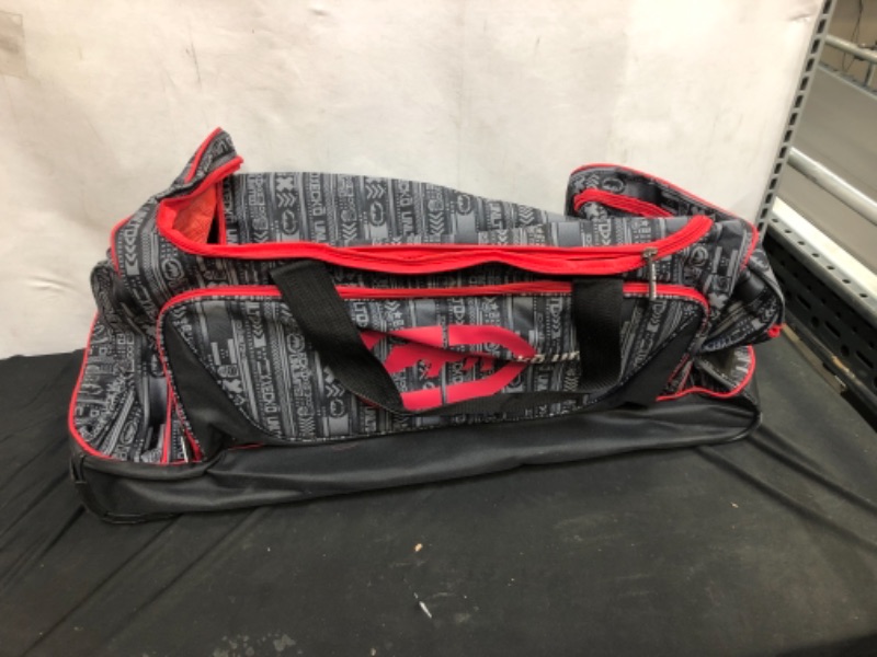 Photo 1 of ECKO DUFFLE BAG WITH WHEELS  - SIZE 31 X 20 INCHES 