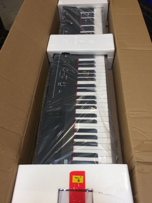 Photo 1 of BOX DAMAGED  BUT ITEM ARE GOOD CONDITION (BRAND NEW OPEN FOR PICTURE,PRODUCT GOOD CONDITION & ALL PARTS COMPLETE)Alesis Recital – 88 Key Digital Piano Keyboard with Semi Weighted Keys, 2x20W Speakers, 5 Voices, Split, Layer and Lesson Mode, FX and Piano L