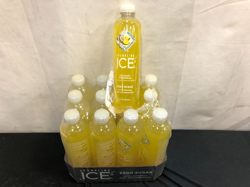 Photo 1 of (EXP: 07-16-2022)Sparkling Ice, Coconut Pineapple Sparkling Water, Zero Sugar Flavored Water, with Vitamins and Antioxidants, Low Calorie Beverage, 17 fl oz Bottles (Pack of 12) 