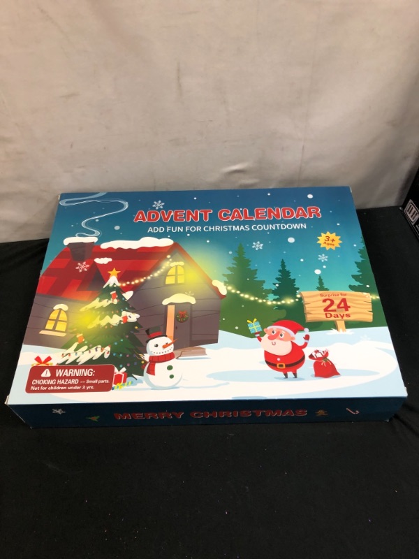 Photo 2 of 2021 Advent Calendar Kids Christmas Countdown Calendar 24 Days Mochi Squichy Toys Pull Back Cars Wind Up Toys Christmas Erasers Christmas Party Favors for Girls Boys
