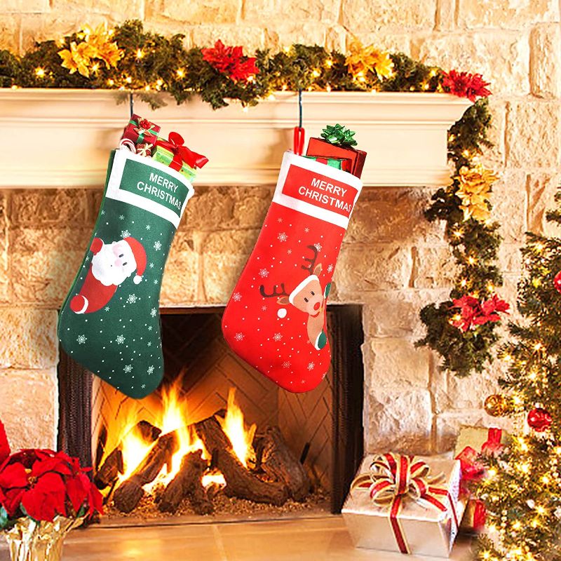 Photo 1 of  EasyAcc Christmas Stockings for Fireplace, 2 Pack 15.7'' Red Green Reindeer Santa Christmas Stocking Christmas Tree Decorations for Christmas Family Holiday Xmas Decor