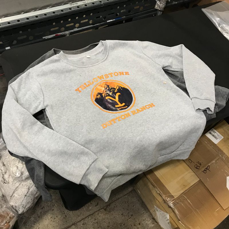 Photo 1 of 4 assorted, Yellow Stone Dutton Ranch sweaters - poor quality and bad sizing. all sizes range around a womens large but are assorted