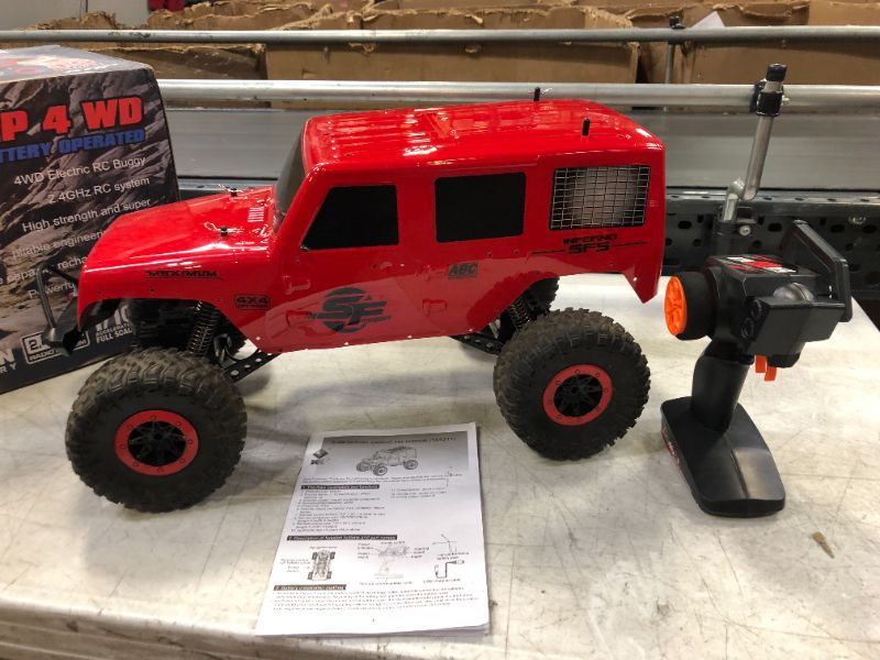 Photo 1 of GoolRC WLtoys 104311 RC Car, 1/10 Scale 4WD 2.4Ghz Remote Control Car, Brushed Motor Off-Road Crawler Car RTR for Kids and Adults