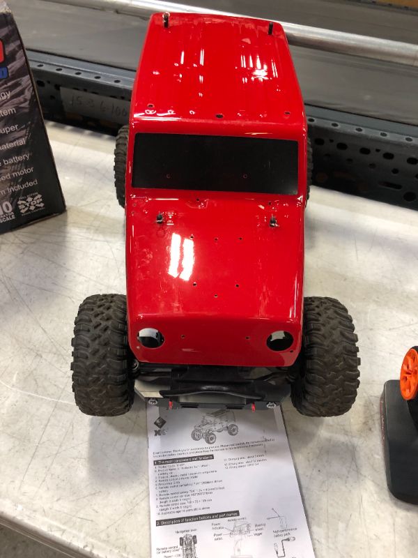 Photo 1 of GoolRC WLtoys 104311 RC Car, 1/10 Scale 4WD 2.4Ghz Remote Control Car, Brushed Motor Off-Road Crawler Car RTR for Kids and Adults