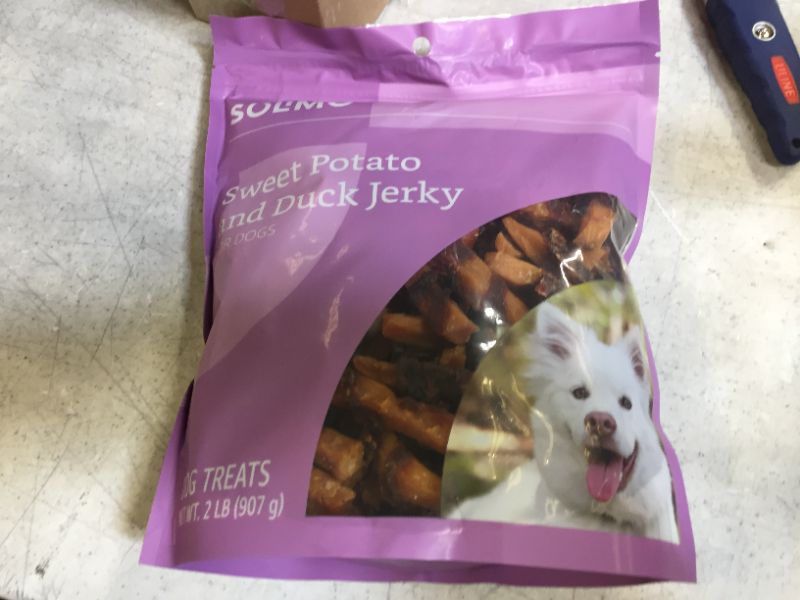 Photo 2 of Amazon Brand - Solimo Jerky Dog Treats, 2 Lb Bag (Chicken, Duck, Sweet Potato Wraps)=----- bb 02 26 2022
