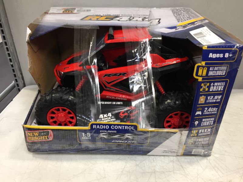 Photo 7 of New Bright RC 1:5 Scale Remote Control Polaris RZR XP PRO ATV 2.4GHz 12.8V---MISSING REMOTE/FLAGS/BATTERY---COULD NOT TEST---
