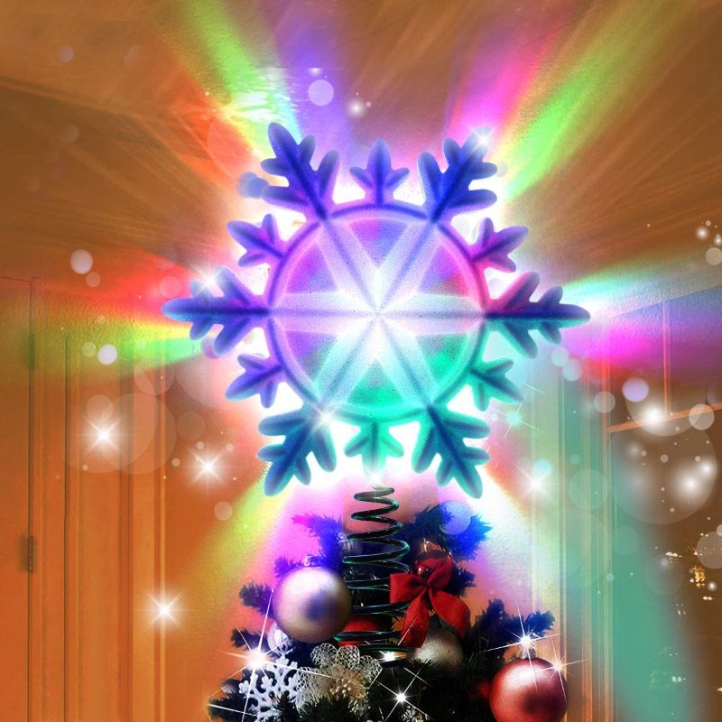 Photo 1 of Christmas Tree Topper Decorations, Sliver Lighted Snowflake Tree Topper with Adjustable 10 Colorful Lighting Models Rotating Magic Rainbow Projector Lights for Wall Christmas Ornaments Home Decor