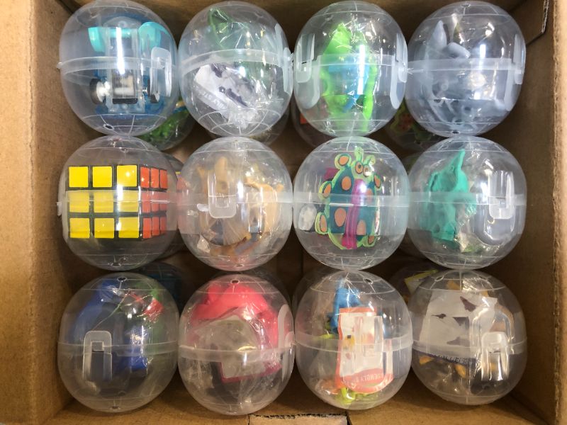 Photo 1 of Egg capsules filled with toys 24 pieces