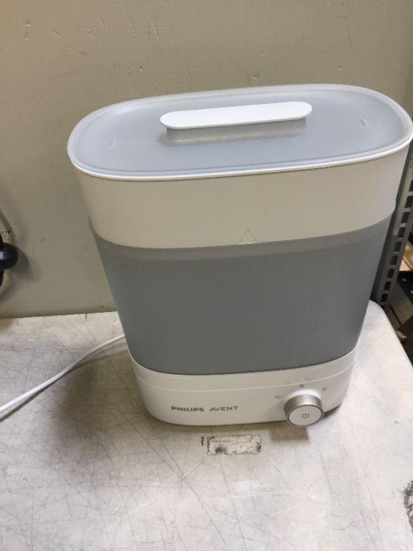 Photo 2 of Philips Avent Premium Baby Bottle Sterilizer with Dryer, SCF293/00
(doesn't turn on )(non functional) (for parts only)