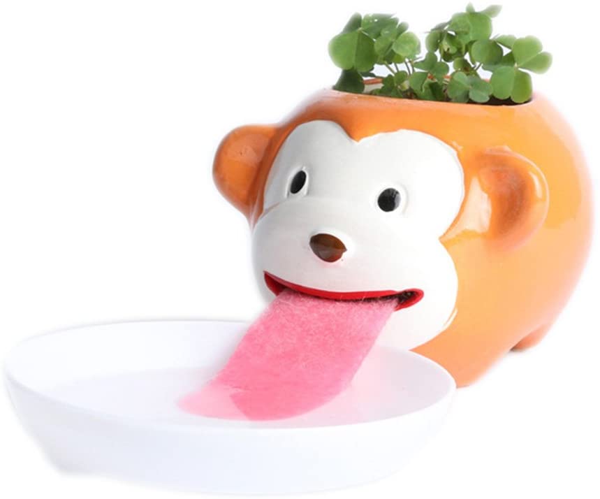 Photo 1 of  Self Watering Animal Planter Drinking