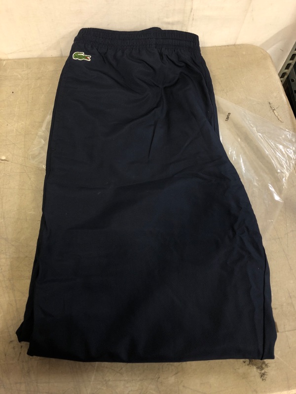 Photo 6 of Lacoste Men's Sport Taffeta Pant with Side Zip Detail, NAVY 
SIZE L 