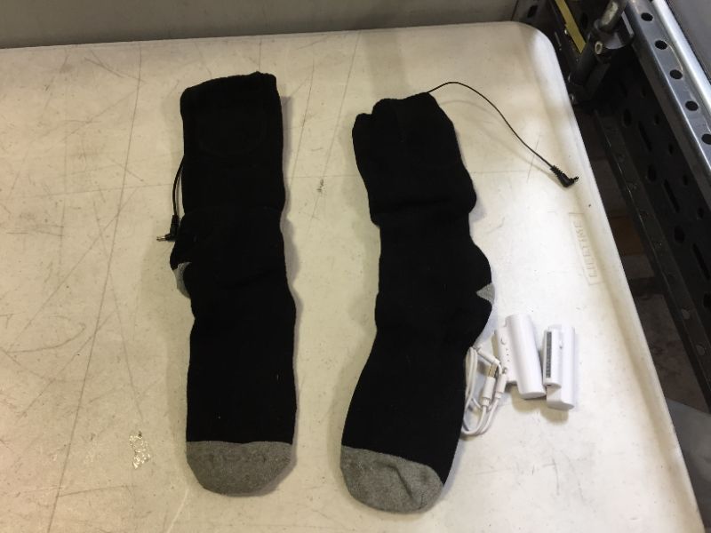 Photo 1 of generic heating socks 