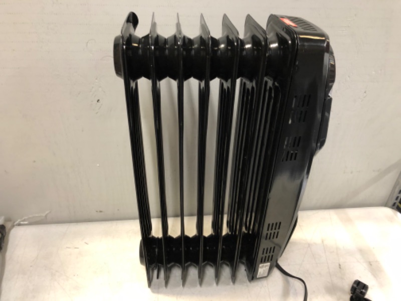 Photo 2 of Honeywell HZ-789 EnergySmart Electric Oil Filled Radiator Whole Room Heater, Black, 24.45"H x 9.06"D x 13.74"W (HZ789)
