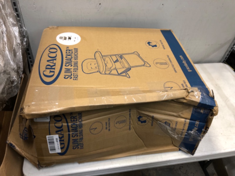Photo 1 of Graco Slim Snacker High Chair, Ultra Compact High Chair, Whisk
