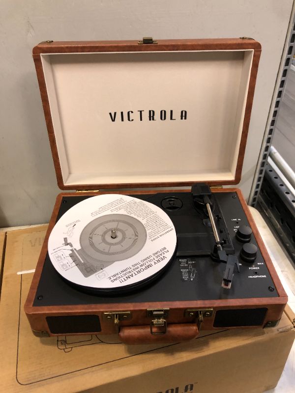 Photo 4 of Victrola Vintage 3-Speed Bluetooth Portable Suitcase Record Player with Built-in Speakers | Upgraded Turntable Audio Sound| Includes Extra Stylus | Brown
