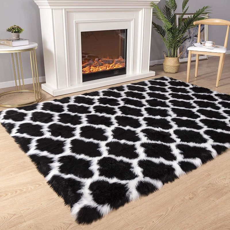 Photo 1 of Carvapet Moroccan Shaggy Soft Faux Sheepskin Fur Area Rugs Floor Mat Luxury Beside Carpet for Bedroom Living Room 3ft x 5ft, WHITE/BLACK
