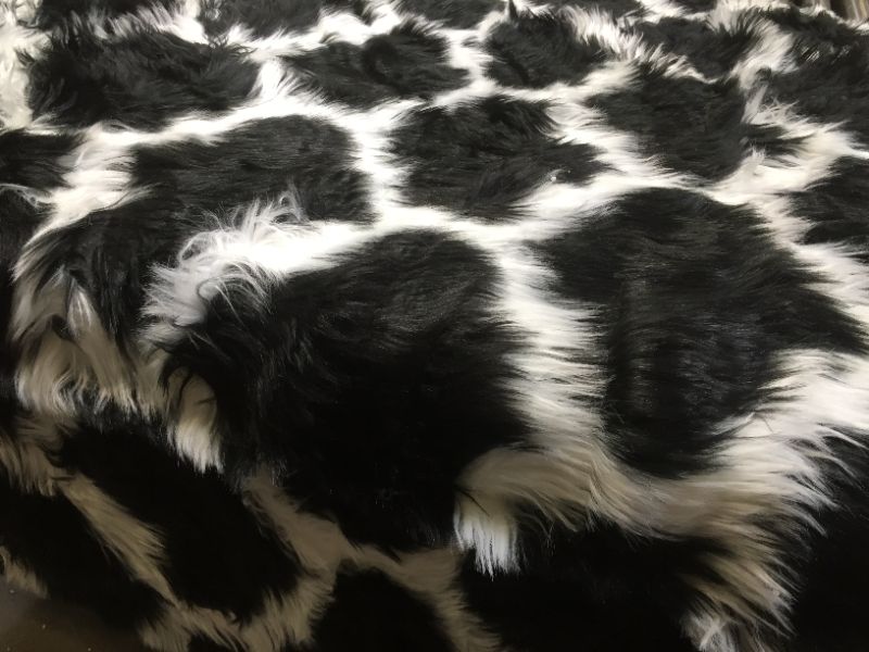 Photo 3 of Carvapet Moroccan Shaggy Soft Faux Sheepskin Fur Area Rugs Floor Mat Luxury Beside Carpet for Bedroom Living Room 3ft x 5ft, WHITE/BLACK
