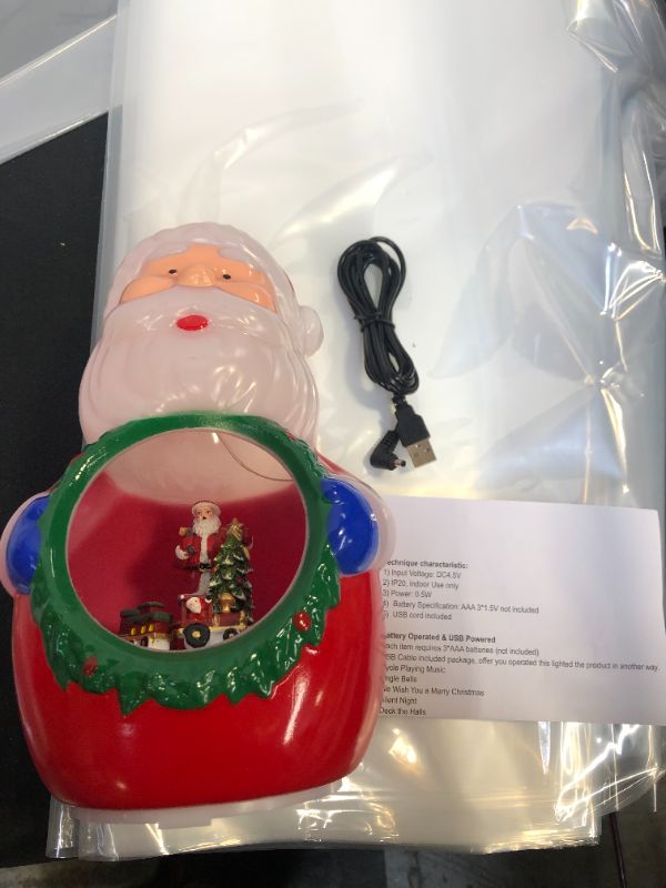 Photo 1 of 10" LIGHTED MUSICAL CHRISTMAS SANTA DECORATION