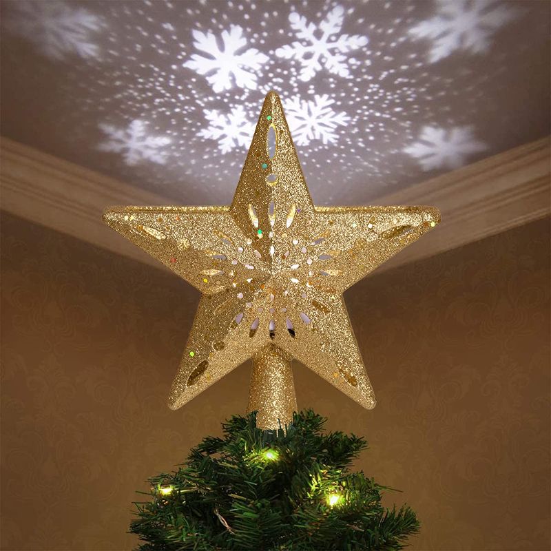 Photo 1 of Christmas Tree Topper Projector Light - 3D Xmas Tree Topper Lighted Star with Rotating Led Projector Snowflake for Christmas Decorations(Gold)
