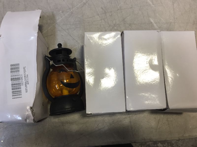 Photo 2 of (4 PACKS) BWWNBY Halloween Lantern Pumpkin Shape Props Gift Home Decor Battery Powered Table Lamp Halloween Decor Good Decoration for Halloween and Theme Parties(TypeC)
