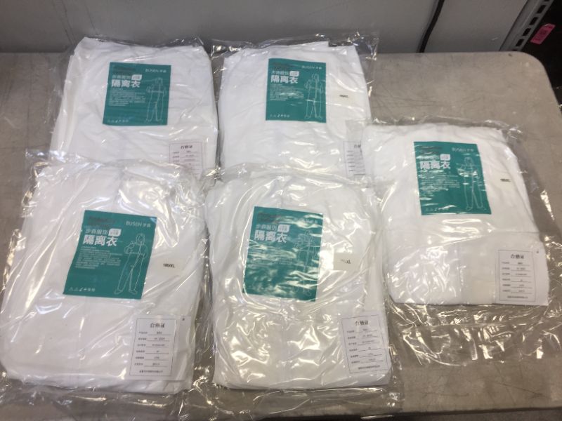 Photo 1 of ( 5 PACKS) BUSEN OVER CLOTHES PROTECTIVE CLOTHING WHITE COVER --- OVERSEAS SIZE XL  **POSSIBLE WATER DAMAGE**