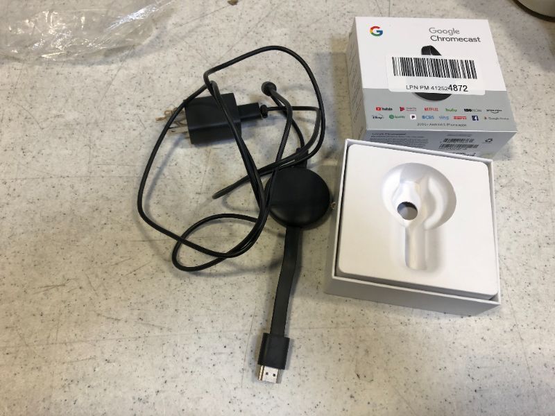 Photo 2 of Google Chromecast - Streaming Device with HDMI Cable - Stream Shows, Music, Photos, and Sports from Your Phone to Your TV
