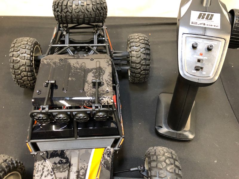 Photo 6 of TESTED - BEZGAR HB121 Hobby Grade 1:12 Scale Beginner RC Trucks, 4WD High Speed 42 Km/h All Terrains Electric Toy Off Road Sand Rall Buggy RC Truck with Rechargeable Batteries for Boys Kids and Adults