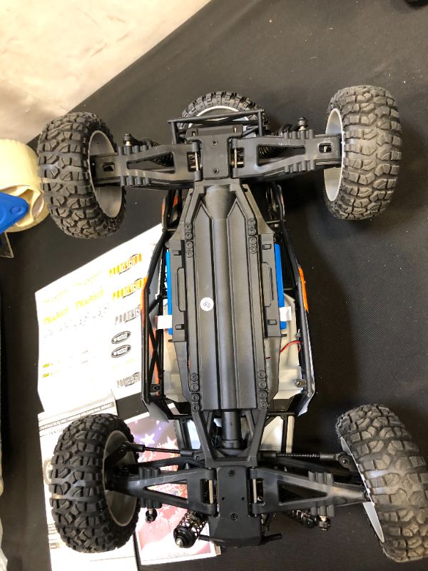 Photo 2 of TESTED - BEZGAR HB121 Hobby Grade 1:12 Scale Beginner RC Trucks, 4WD High Speed 42 Km/h All Terrains Electric Toy Off Road Sand Rall Buggy RC Truck with Rechargeable Batteries for Boys Kids and Adults