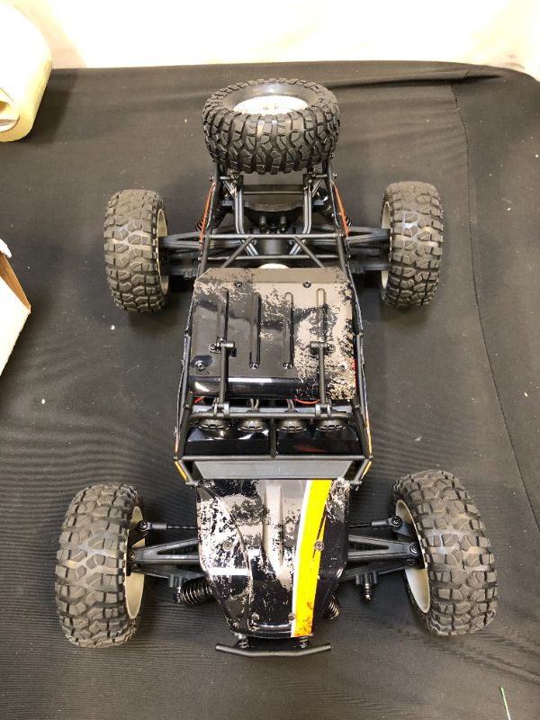 Photo 3 of TESTED - BEZGAR HB121 Hobby Grade 1:12 Scale Beginner RC Trucks, 4WD High Speed 42 Km/h All Terrains Electric Toy Off Road Sand Rall Buggy RC Truck with Rechargeable Batteries for Boys Kids and Adults