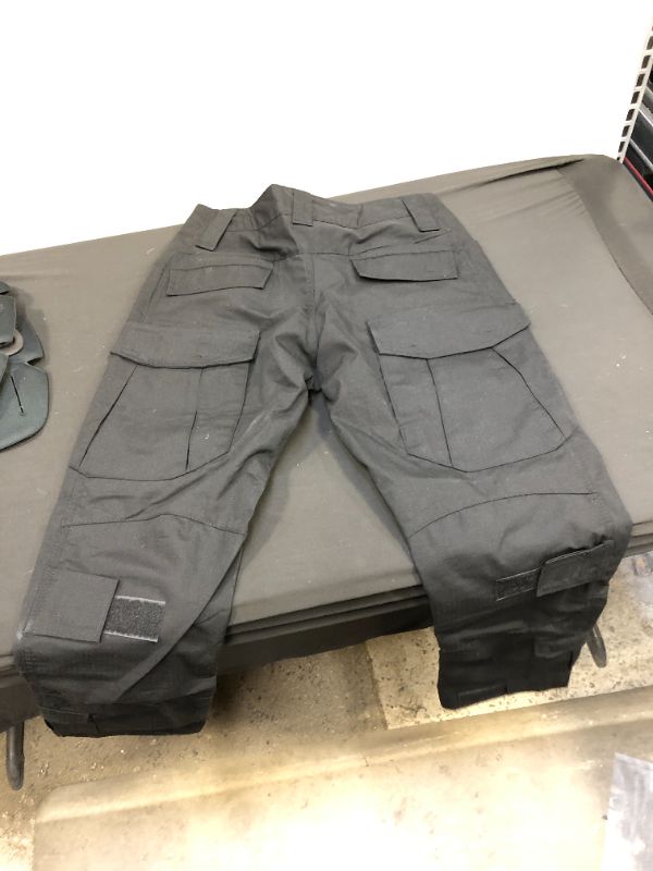 Photo 2 of BLACK TACTICAL PANTS SIZE 30 
WITH KNEE PADS