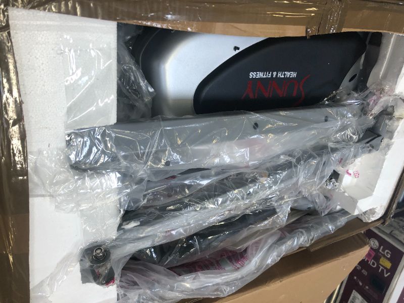 Photo 1 of Sunny Health & Fitness SF-E905 Elliptical Machine Cross Trainer with 8 Level Resistance and Digital Monitor , Gray, White, 28 L x 17 W x 57 H
