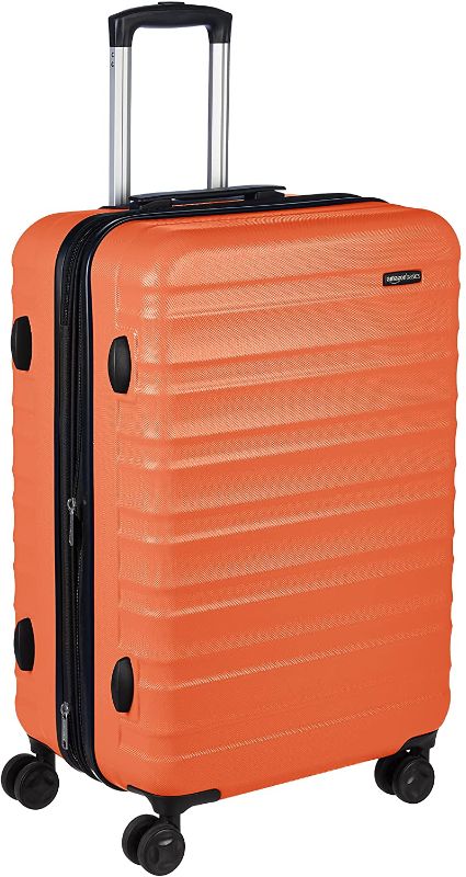 Photo 1 of Amazon Basics 26-Inch Hardside Spinner, Orange
