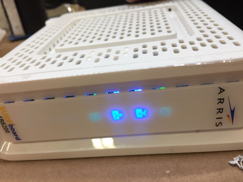 Photo 1 of **BRAND NEW FACTORY SEALED BUT OPENED FOR TAKE PICTURE** ARRIS SURFboard SB8200 DOCSIS 3.1 Gigabit Cable Modem | Approved for Cox, Xfinity, Spectrum & others | White , Max Internet Speed Plan 1000 Mbps
