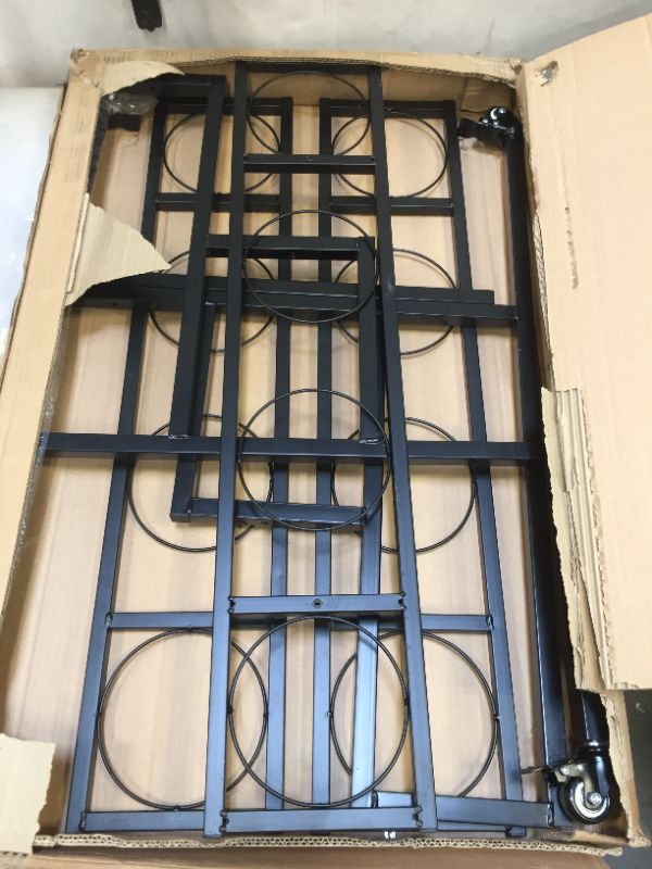 Photo 1 of 3 TIER METAL PLANT STAND - BLACK
MISSING SOME HARDWARE/MANUAL 
