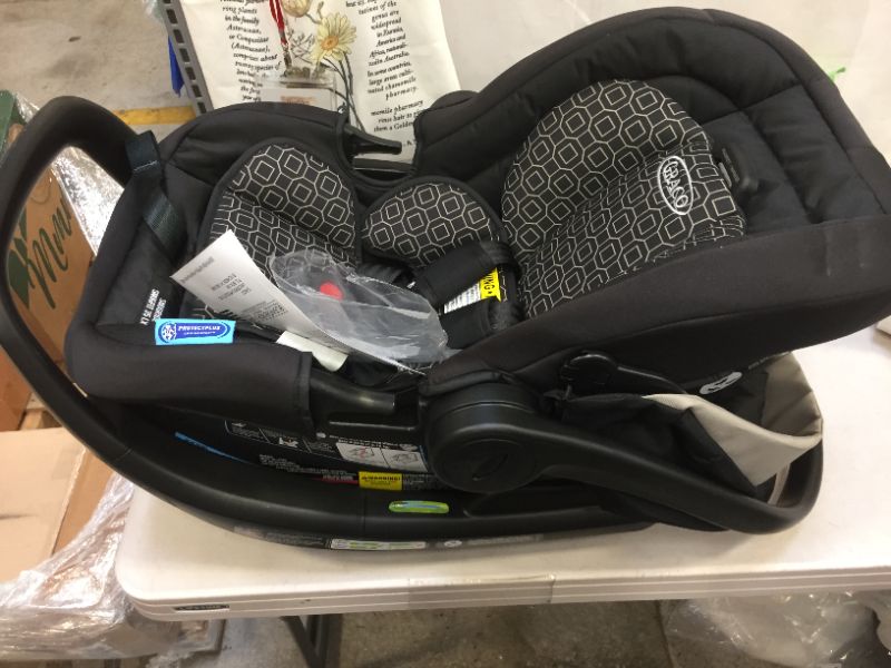 Photo 2 of GRACO SnugFit 35 DLX Infant Car Seat Baby Car Seat with Anti Rebound Bar, Pierce , 27.5x17.5x25.5 Inch (Pack of 1)
