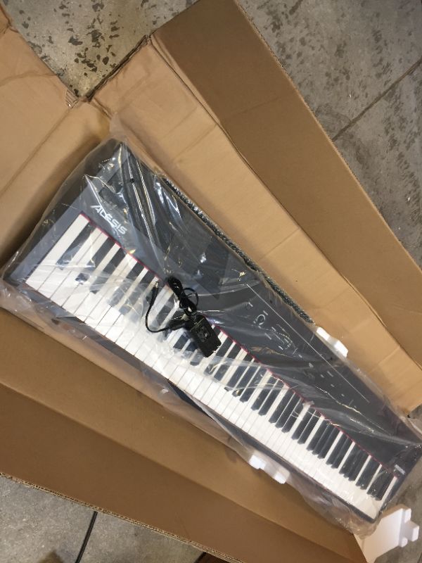 Photo 9 of BOX DAMAGED  BUT ITEM ARE GOOD CONDITION (BRAND NEW OPEN FOR PICTURE,PRODUCT GOOD CONDITION & ALL PARTS COMPLETE)Alesis Recital – 88 Key Digital Piano Keyboard with Semi Weighted Keys, 2x20W Speakers, 5 Voices, Split, Layer and Lesson Mode, FX and Piano L