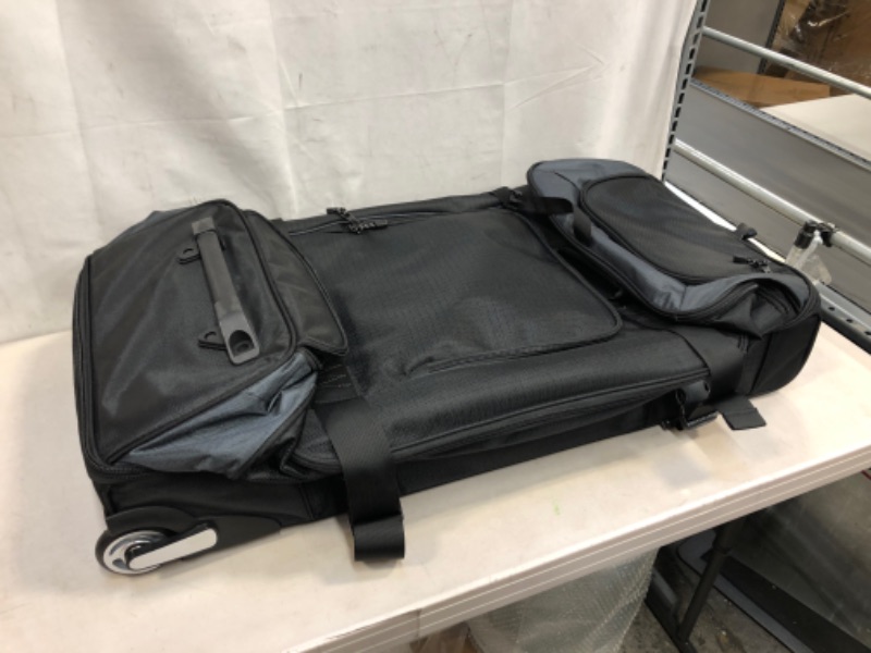 Photo 1 of LARGE SUIT CASE WITH WHEELS 