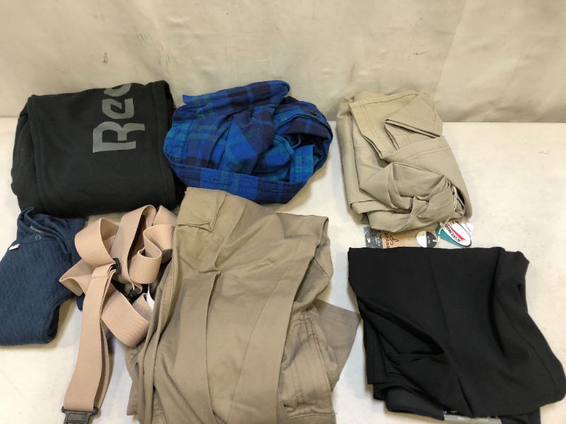 Photo 1 of (New and Used)Different Style And Size Women's & Men's Clothes