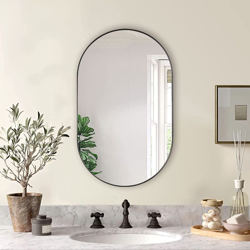 Photo 1 of ANDY STAR Black Oval Mirror, 20x33’’ Oval Black Mirror Stainless Steel Metal Pill Mirror for Bathroom, Entryway, Living Room, Contemporary 1" Deep Set Design Wall Mount Hang Vertical or Horizontal
