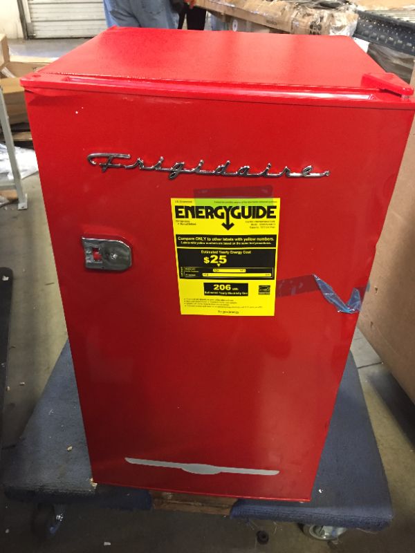 Photo 2 of Frigidaire Retro Bar Fridge Refrigerator with Side Bottle Opener, 3.2 cu. ft, Red
** DENTS AROUND **