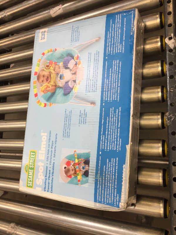Photo 1 of Bright Starts I Spot Elmo! Vibrating Baby Bouncer - Blue